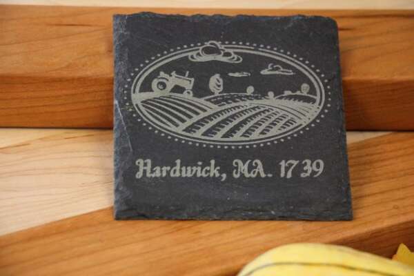 IMG6986 Dragonfly Wood Arts Customizable 4inch square slate coaster with a picture of a tractor plowing a field and the text hardwick ma 1739 dragonfly wood arts